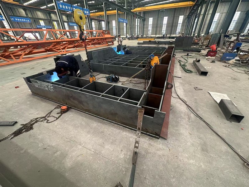 After careful evaluation, the customer decided to adopt our 10-ton customized transfer trolley, which completely solved the long-distance transportation problem. The polyurethane wheels easily adapt to the workshop floor conditions, allowing five transfers to be completed in just four hours. After careful evaluation, the customer decided to adopt our 10-ton customized transfer trolley, which completely solved the long-distance transportation problem. The polyurethane wheels easily adapt to the workshop floor conditions, allowing five transfers to be completed in just four hours.